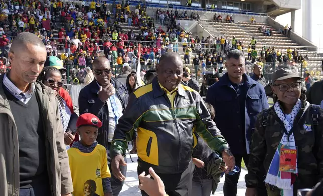 South African President Cyril Ramaphosa, centre, attends a May Day rally in Cape Town, South Africa, Wednesday, May, 1, 2024. (AP Photo/Nardus Engelbrecht)