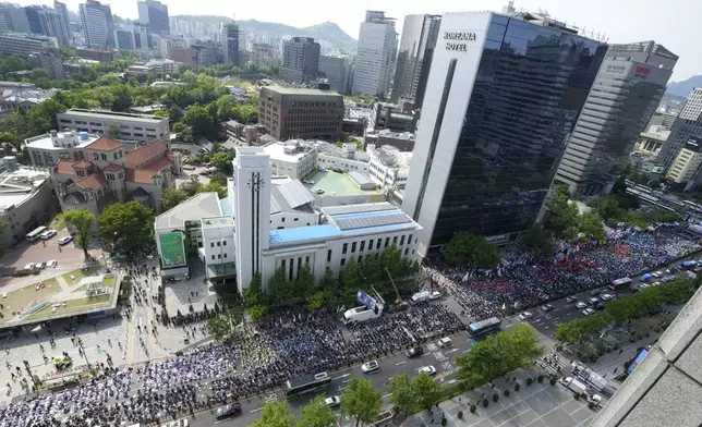 Members of the Korean Confederation of Trade Unions gather to attend a rally on May Day in Seoul, South Korea, Wednesday, May 1, 2024. Workers, activists and others in Asian capitals took to the streets on Wednesday to mark May Day with protests over rising prices and governments' labor polices and calls for greater labor rights. (AP Photo/Ahn Young-joon)