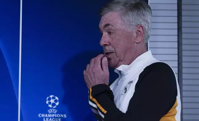 Real Madrid's head coach Carlo Ancelotti arrives to give a press conference in Madrid, Spain, Tuesday, May 7, 2024. The semifinal second leg Champions League soccer match between Real Madrid Bayern Munich will be played on Wednesday in Madrid. (AP Photo/Paul White)