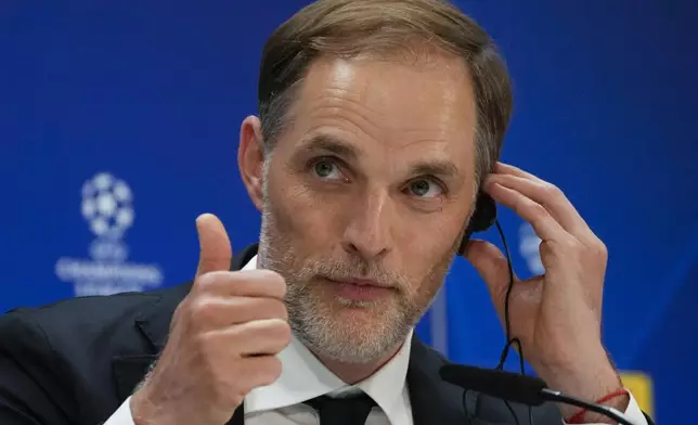 Bayern's head coach Thomas Tuchel gives the thumbs up during a press conference at the Santiago Bernabeu stadium in Madrid, Spain, Tuesday, May 7, 2024. The semifinal second leg Champions League soccer match between Real Madrid and Bayern Munich will be played on Wednesday in Madrid. (AP Photo/Paul White)
