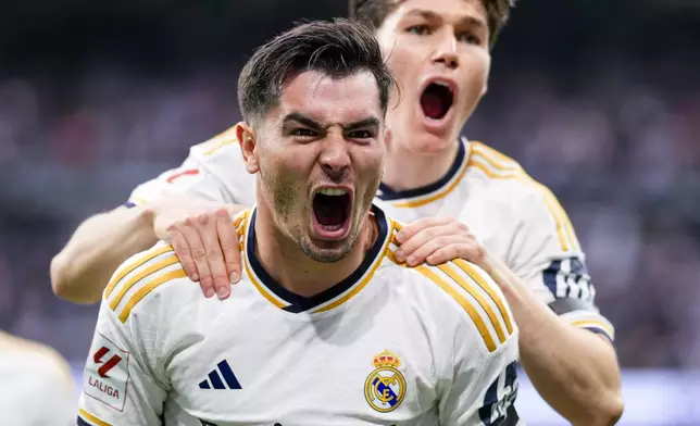 Real Madrid's Brahim Diaz celebrates after scoring his side's opening goal during the the Spanish La Liga soccer match between Real Madrid and Cadiz at the Santiago Bernabeu stadium in Madrid, Spain, Saturday, May 4, 2024. (AP Photo/Manu Fernandez)