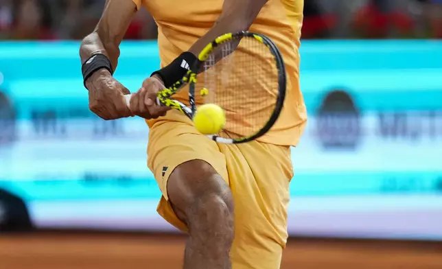 Felix Auger-Aliassime, of Canada, competes against to Andrey Rublev, of Russia, during the final match of the Madrid Open tennis tournament in Madrid, Spain, Sunday, May 5, 2024. (AP Photo/Manu Fernandez)