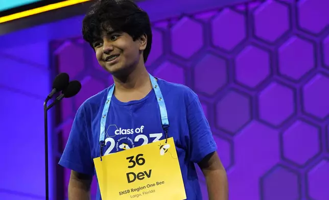FILE - Dev Shah, 14, from Largo, Fla., competes during the finals of the Scripps National Spelling Bee, Thursday, June 1, 2023, in Oxon Hill, Md. Since 1999, 28 of the last 34 Scripps National Spelling bee champions have been Indian American. The experiences of first-generation Indian Americans and their spelling bee champion children illustrate the economic success and cultural impact of the nation’s second-largest immigrant group. (AP Photo/Nathan Howard, File)