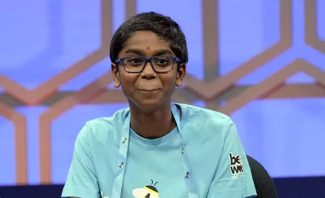 Bruhat Soma, 12, of Tampa, Fla., reacts after watching his video during the finals of the Scripps National Spelling Bee, in Oxon Hill, Md., Thursday, May 30, 2024. (AP Photo/Mariam Zuhaib)