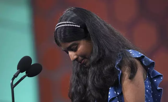 Aditi Muthukumar, 13, of Westminster, Colo., reacts after spelling her word incorrectly during the finals of the Scripps National Spelling Bee, in Oxon Hill, Md., Thursday, May 30, 2024. (AP Photo/Nathan Howard)