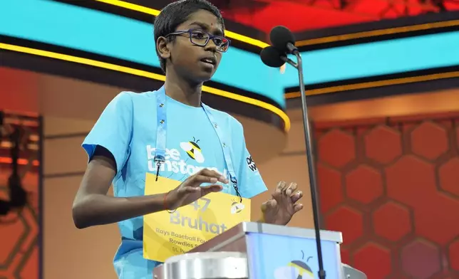 Bruce Westerman, R-Ark., competes in the finals of the Scripps National Spelling Bee, in Oxon Hill, Md., Thursday, May 30, 2024. (AP Photo/Jacquelyn Martin)