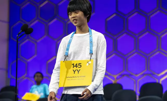 YY Liang, 12, Hartsdale, N.Y., succesfully spells her final word during the semifinals of the Scripps National Spelling Bee, in Oxon Hill, Md., Wednesday, May 29, 2024. Eight spellers including Liang will head to Thursday's finals. (AP Photo/Jacquelyn Martin)