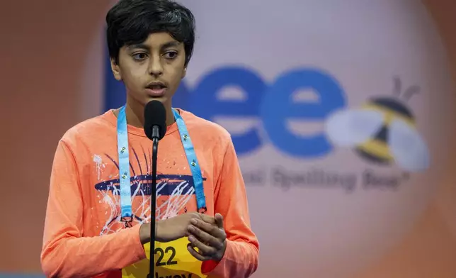 Shrey Parikh, 12, of Rancho Cucamonga, Calif., spells his final word correctly earning him a place in the finals, during the semifinals of the Scripps National Spelling Bee, in Oxon Hill, Md., Wednesday, May 29, 2024. Eight spellers including Parikh will head to Thursday's finals. (AP Photo/Jacquelyn Martin)