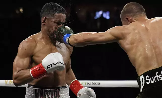 Eimantas Stanionis lands a left to Gabriel Maestre in a welterweight title fight Saturday, May 4, 2024, in Las Vegas. (AP Photo/John Locher)