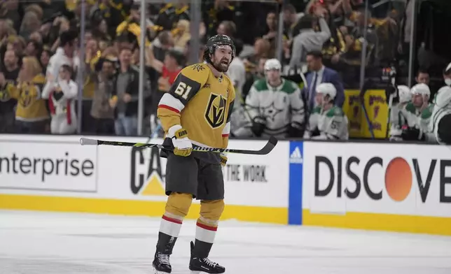 Vegas Golden Knights right wing Mark Stone (61) celebrates after scoring against the Dallas Stars during the third period in Game 6 of an NHL hockey Stanley Cup first-round playoff series Friday, May 3, 2024, in Las Vegas. (AP Photo/John Locher)