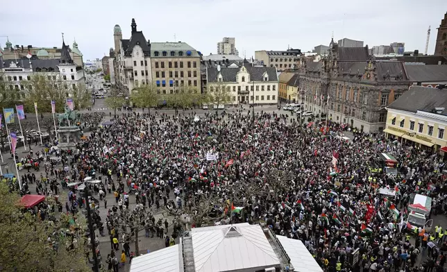 Protestors takes part in the Stop Israel demonstration between Stortorget and Mölleplatsen in Malmö, Sweden, Thursday, May 9, 2024. There have been calls for Israel to be excluded from the Eurovision Song contest because of its conduct in its war against Hamas. (Johan Nilsson/TT News Agency via AP)