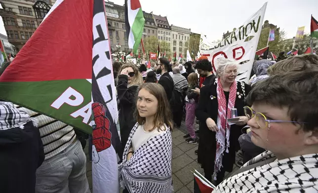 Climate activist Greta Thunberg takes part in a Stop Israel demonstration, between Stortorget and Mölleplatsen in Malmö, Sweden, Thursday, May 9, 2024. There have been calls for Israel to be excluded from the Eurovision Song contest because of its conduct in its war against Hamas. (Johan Nilsson/TT News Agency via AP)