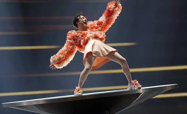 Nemo of Switzerland performing the song The Code during the dress rehearsal for the final at the Eurovision Song Contest in Malmo, Sweden, Friday, May 10, 2024. (AP Photo/Martin Meissner)