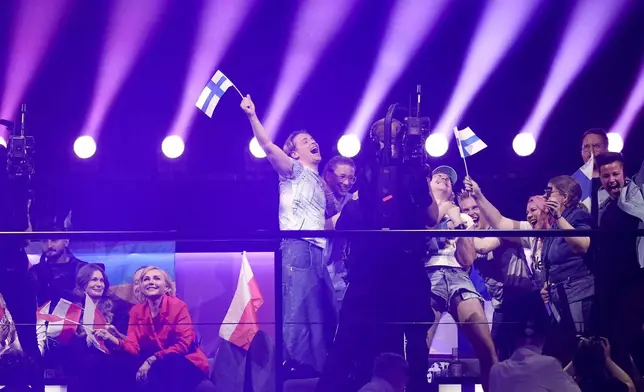 Windows95man of Finland celebrate qualifying for the grand final during the first semi-final at the Eurovision Song Contest in Malmo, Sweden, Tuesday, May 7, 2024. (AP Photo/Martin Meissner)
