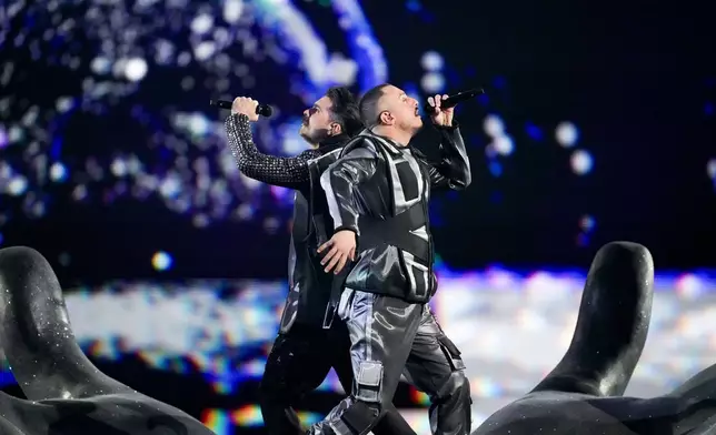 FAHREE, right, and Ilkin Dovlatov of Azerbaijan perform the song Ozunlə Aparduring the first semi-final at the Eurovision Song Contest in Malmo, Sweden, Tuesday, May 7, 2024. (AP Photo/Martin Meissner)
