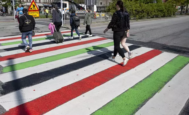 A zebra crossing at the Mollevangstorget square is painted in the Palestinian colors in Malmo, Sweden, Thursday, May 09, 2024. During Thursday, several protests are expected against Israel's participation in the 68th edition of the Eurovision Song Contest (ESC) at the Malmo Arena. (Johan Nilsson/TT News Agency via AP)