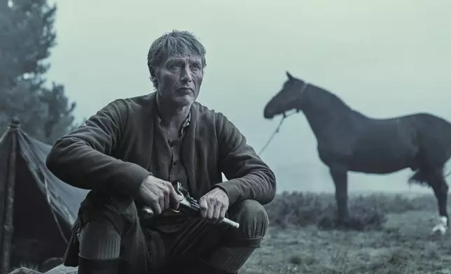 This image released by Magnolia Pictures shows Mads Mikkelsen in a scene from "The Promised Land." (Henrik Ohsten/Magnolia Pictures via AP)