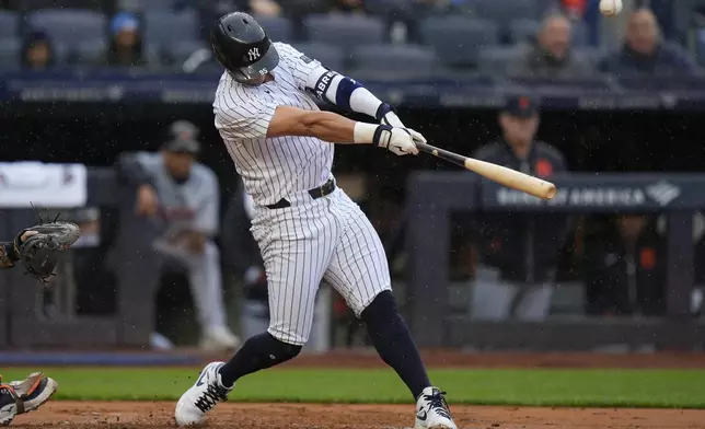 New York Yankees' Oswaldo Cabrera hits and RBI double during the second inning of the baseball game against the Detroit Tigers at Yankee Stadium Sunday, May 5, 2024, in New York. (AP Photo/Seth Wenig)