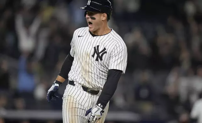 New York Yankees' Anthony Rizzo celebrates after hitting a walk-off RBI single during the ninth inning of a baseball game against the Detroit Tigers, Friday, May 3, 2024, in New York. The Yankees won 2-1. (AP Photo/Frank Franklin II)