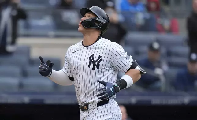 New York Yankees' Aaron Judge reacts after hitting a solo home run during the first inning of a baseball game against the Detroit Tigers at Yankee Stadium Sunday, May 5, 2024, in New York. (AP Photo/Seth Wenig)