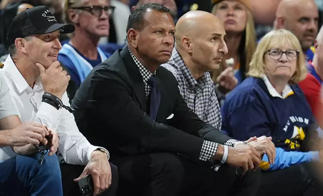 Minnesota Timberwolves minority owner Alex Rodriguez looks on in the second half of Game 1 of an NBA basketball second-round playoff series against the Denver Nuggets Saturday, May 4, 2024, in Denver. (AP Photo/David Zalubowski)