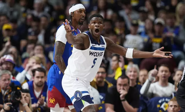 Minnesota Timberwolves guard Anthony Edwards (5) reacts after not getting a call as Denver Nuggets guard Kentavious Caldwell-Pope, left, looks on in the first half of Game 1 of an NBA basketball second-round playoff series Saturday, May 4, 2024, in Denver. (AP Photo/David Zalubowski)