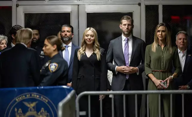 From left, Donald Trump Jr., Tiffany Trump, Eric Trump and Lara Trump stand near former President Donald Trump outside of Manhattan Criminal Court, Tuesday, May 28, 2024, in New York. (Justin Lane/Pool Photo via AP)