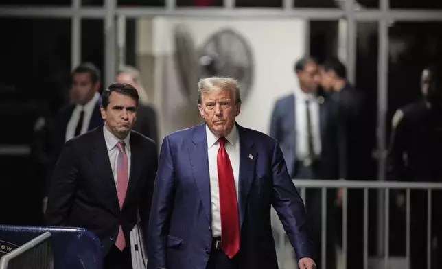 Former President Donald Trump walks outside the courtroom of his trial at Manhattan criminal court, Tuesday, April 30, 2024, in New York. (Curtis Means/Pool Photo via AP)