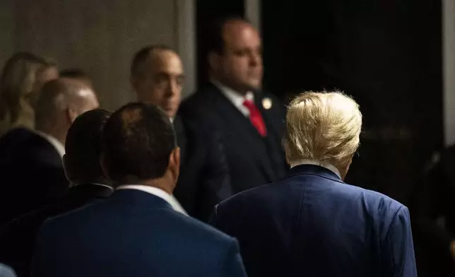 Former President Donald Trump walks away after talking to reporters outside the Manhattan Criminal Court, Friday, May, 3, 2024, in New York. (Doug Mills/The New York Times via AP, Pool)