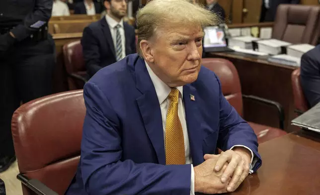 Former President Donald Trump sits at the defense table in Manhattan criminal court, Tuesday, May 7, 2024, in New York. (Sarah Yenesel/Pool Photo via AP)
