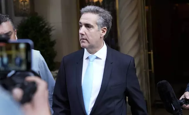 Michael Cohen leaves his apartment building in New York, Tuesday, May 14, 2024. Cohen, former President Donald Trump’s fixer-turned-foe is returning to the witness stand for a bruising round of questioning from the former president’s lawyers. (AP Photo/Seth Wenig)