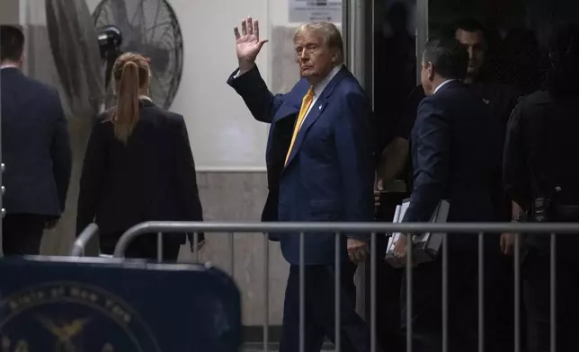 Former President Donald Trump exits the courtroom during a break from his trial at Manhattan criminal court in New York, Thursday, May 2, 2024. (Jeenah Moon/Pool Photo via AP)