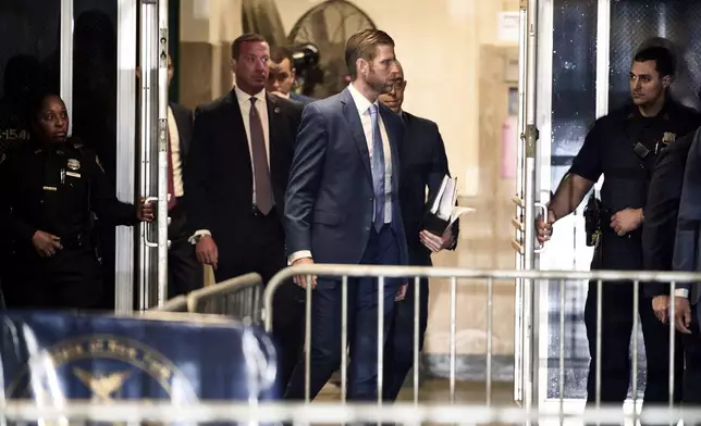 Eric Trump enters Manhattan criminal court after a break in former President Donald Trump's trial in New York, Tuesday, April 30, 2024. (Curtis Means/Pool Photo via AP)