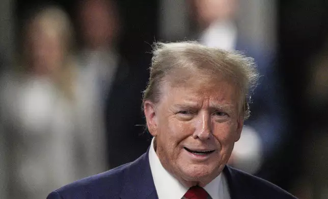 Former President Donald Trump speaks to the media outside the courtroom of his trial at Manhattan criminal court, Tuesday, April 30, 2024, in New York. (Curtis Means/Pool Photo via AP)