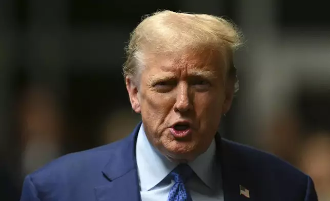 Former President Donald Trump speaks to the media at the end of the day of his hush money trial, in New York, Thursday, May 9, 2024. (Angela Weiss/Pool Photo via AP)