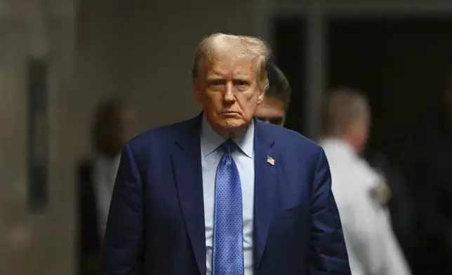 Former President Donald Trump arrives at Manhattan Criminal Court in New York, Thursday, May 9, 2024. (Angela Weiss/Pool Photo via AP)