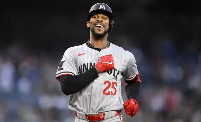 Minnesota Twins' Byron Buxton celebrates his two-run home run against the Washington Nationals during the fifth inning of a baseball game Tuesday, May 21, 2024, in Washington. (AP Photo/Nick Wass)