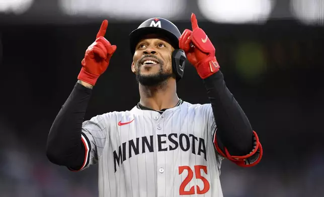 Minnesota Twins' Byron Buxton celebrates his two-run home run against the Washington Nationals during the fifth inning of a baseball game Tuesday, May 21, 2024, in Washington. (AP Photo/Nick Wass)