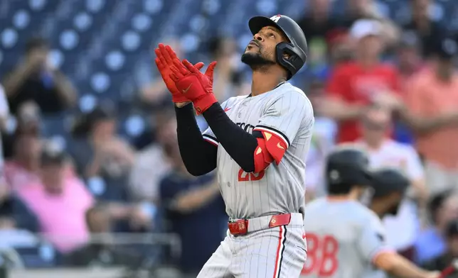 Minnesota Twins' Byron Buxton celebrates his home run against the Washington Nationals during the second inning of a baseball game Tuesday, May 21, 2024, in Washington. (AP Photo/Nick Wass)