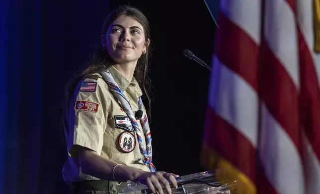 Selby Chipman, 20-years-old, speaks to the Boys Scouts of America annual meeting in Orlando, Fla. Tuesday, May 7, 2024. Chipman, a student at the University of Missouri, is and Inaugural female Eagle Scout and the Assistant Scoutmaster for an all girls troop 8219 in Oak Ridge, NC. The Boy Scouts of America is changing its name to Scouting America for the first time in its 114-year history. (AP Photo/Kevin Kolczynski)