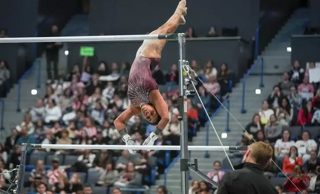 Gabby Douglas competes on the uneven bars during the U.S. Classic gymnastics event Saturday, May 18, 2024, in Hartford, Conn. (AP Photo/Bryan Woolston)