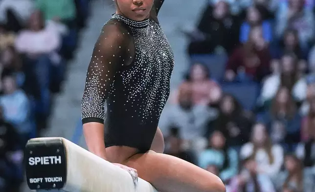 Konnor McClain competes on the balance beam during the U.S. Classic gymnastics event Saturday, May 18, 2024, in Hartford, Conn. (AP Photo/Bryan Woolston)
