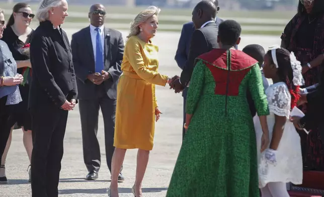 First lady Jill Biden, center, greets Kenya's President William Ruto and first lady Rachel Ruto, center right, as they arrive at Andrews Air Force Base, Md., Wednesday, May 22, 2024, for a State Visit to the United States. (AP Photo/Luis M. Alvarez)