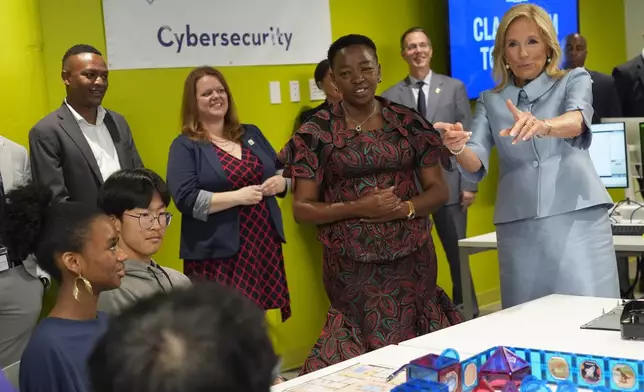 First lady Jill Biden, from right, and Kenya's first lady Rachel Ruto speak to students at a cybersecurity class at the Advanced Technical Center, Thursday, May 23, 2024, in Washington. (AP Photo/Jacquelyn Martin)