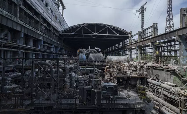 A thermal power plant damaged by a Russian rocket attack in Ukraine, Tuesday, May 21, 2024. (AP Photo/Evgeniy Maloletka)