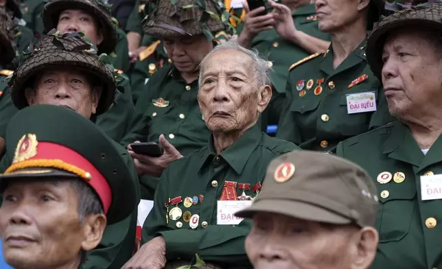 Veterans attend a parade commemorating the victory of Dien Bien Phu battle in Dien Bien Phu, Vietnam, Tuesday, May 7, 2024. Vietnam is celebrating the 70th anniversary of the battle of Dien Bien Phu, where the French army was defeated by Vietnamese troops, ending the French colonial rule in Vietnam. (AP Photo/Hau Dinh)