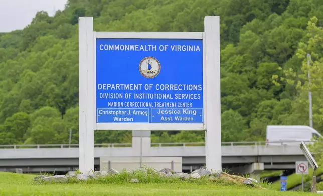 The Marion Correctional Treatment Center entrance sign is shown Thursday, May 16, 2024, in Marion, Va. A lawsuit over a Virginia prison inmate's death has raised broader questions about conditions at the lockup, and newly obtained records are now providing further insights. The records obtained by The Associated Press show inmates at the Marion Correctional Treatment Center, which houses predominantly mentally ill offenders, were hospitalized for hypothermia at least 13 times in three years. (AP Photo/Earl Neikirk)