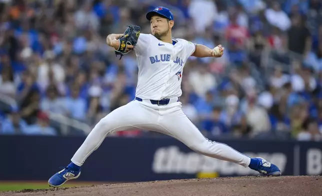 Toronto Blue Jays pitcher Yusei Kikuchi throws to a Chicago White Sox batter during the second inning of a baseball game Tuesday, May 21, 2024, in Toronto. (Christopher Katsarov/The Canadian Press via AP)