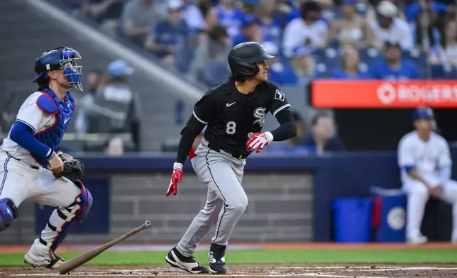 Chicago White Sox's Nicky Lopez watches his RBI single against the Toronto Blue Jays during the second inning of a baseball game Tuesday, May 21, 2024, in Toronto. (Christopher Katsarov/The Canadian Press via AP)