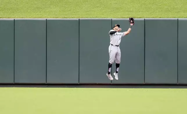 Chicago White Sox center fielder Tommy Pham catches a fly ball hit by St. Louis Cardinals' Lars Nootbaar during the sixth inning of a baseball game Sunday, May 5, 2024, in St. Louis. (AP Photo/Scott Kane)